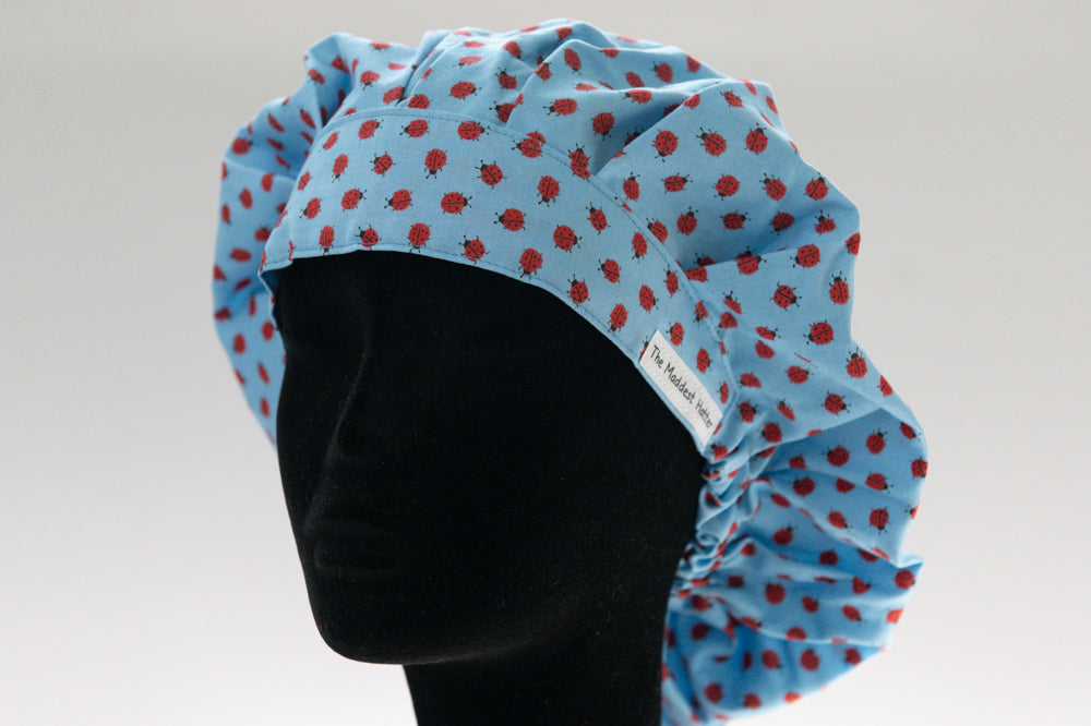 Pale Blue Lady Bugs Bouffant Style Surgical