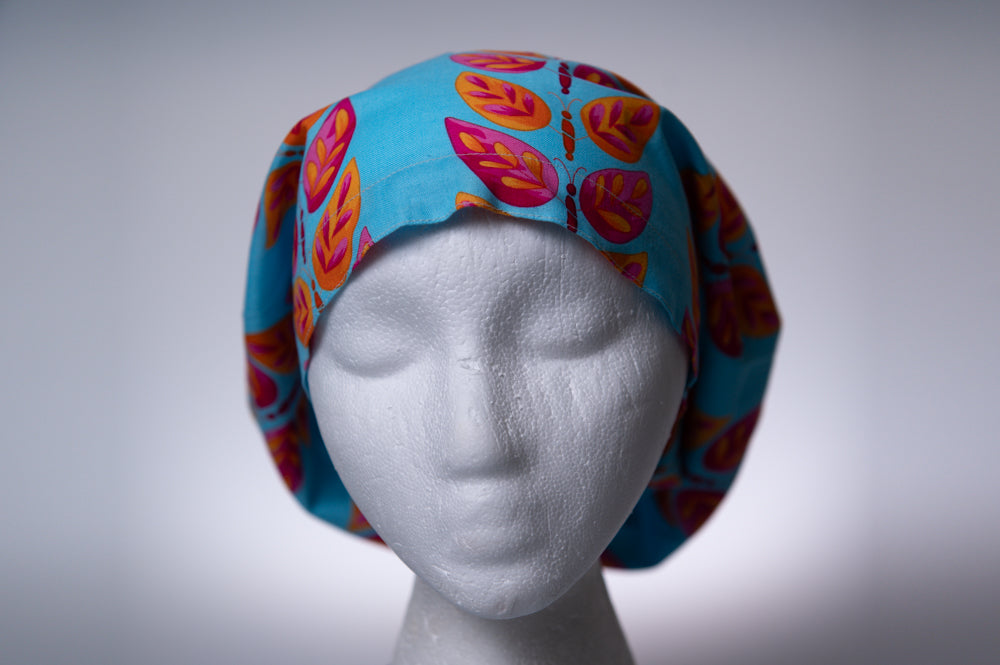 Turquoise Tropical Leaves Hattie Style Surgical Hat