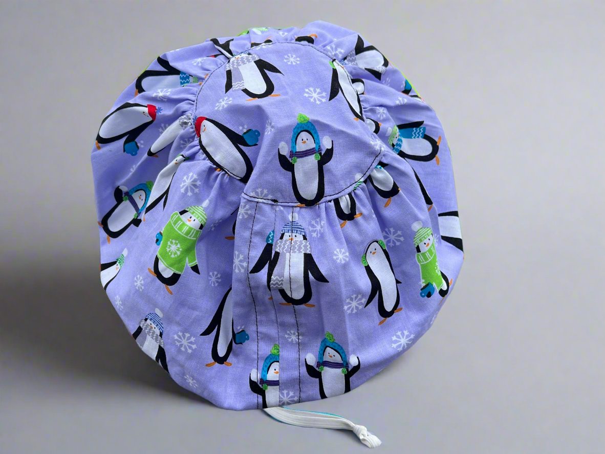 Playful Winter Penguins Hattie Style Surgical Hat